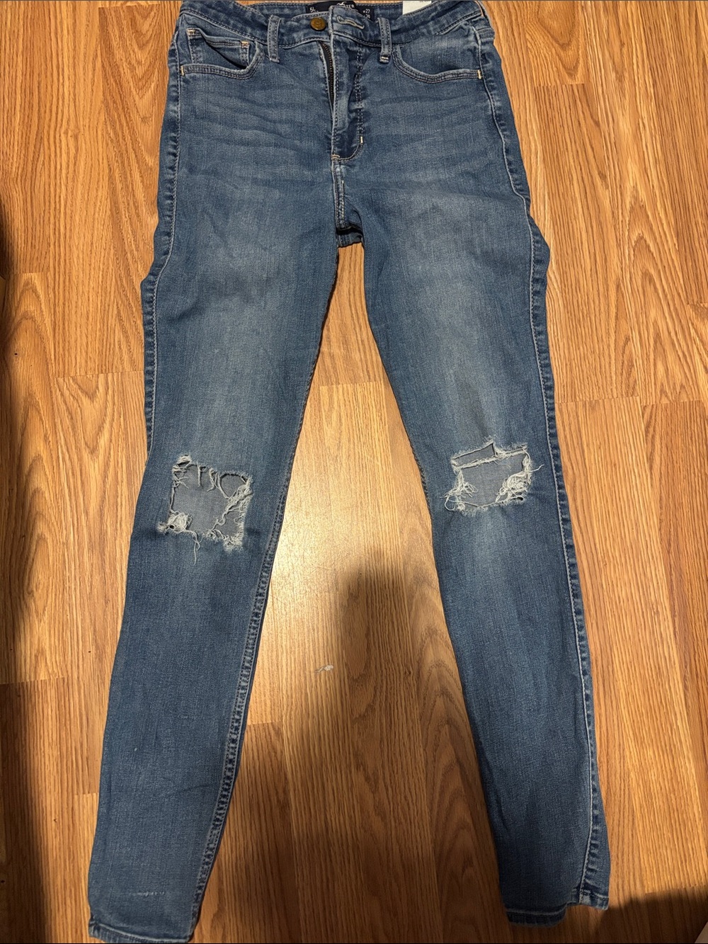 Size 5 Long. Ultra High Rise Super Skinny Jeans. Hollister Medium Blue with Rips